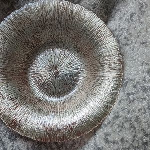 Copper and silver glass bowl